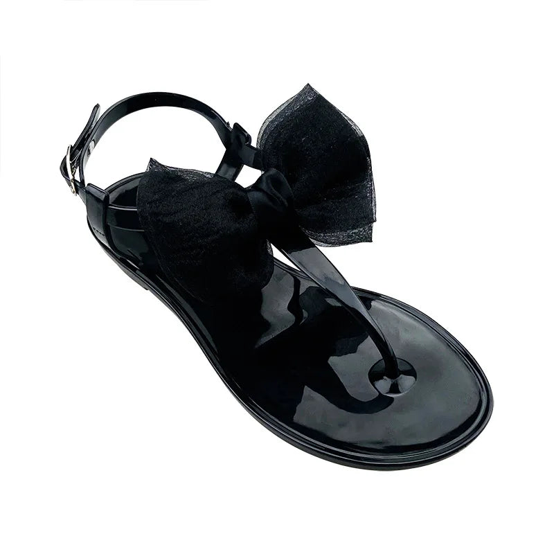Flat Soled Sandals Women's 2026 Summer New Simple Jelly Outer Wear Casual Versatile Solid Color Transparent Beach Sandals Women