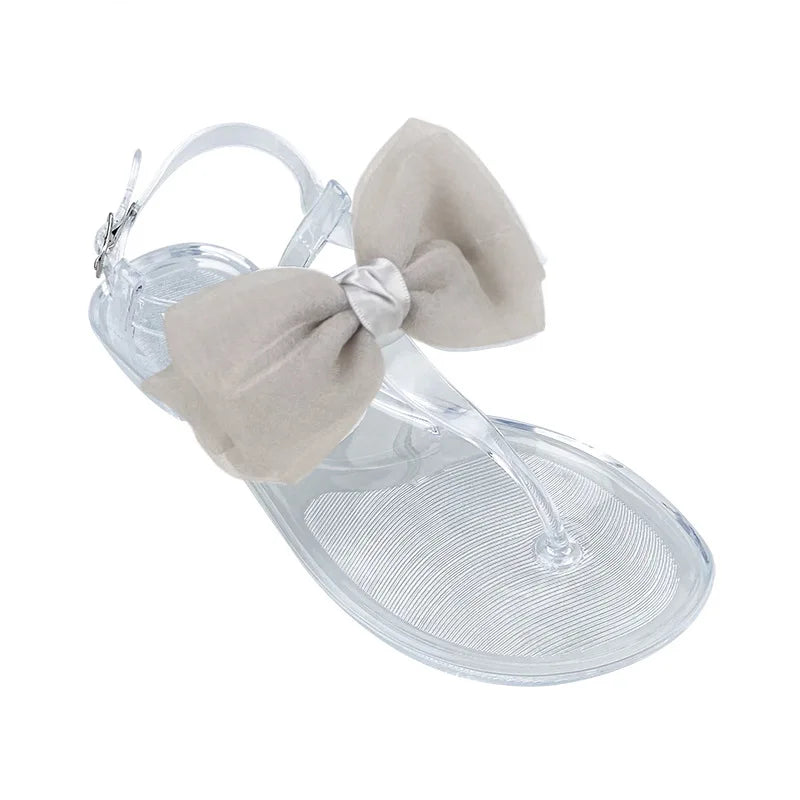Flat Soled Sandals Women's 2026 Summer New Simple Jelly Outer Wear Casual Versatile Solid Color Transparent Beach Sandals Women