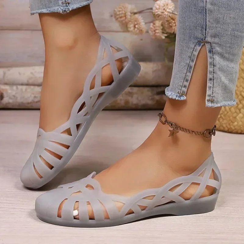 Ladies Hollow Cutout Jelly Flat Sandals PVC Closed Toe Back Strap Shoes Lightweight Non Slip Summer Beach Daily Walking Sandals