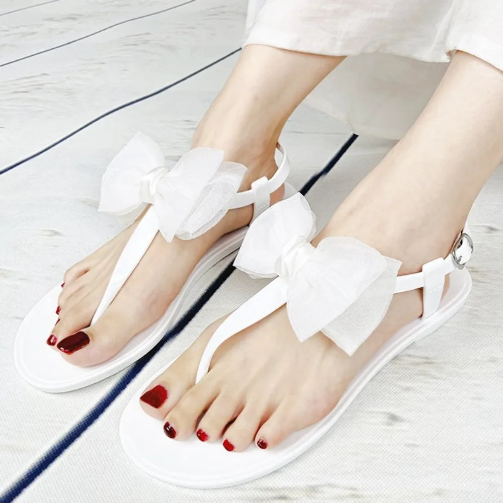 Flat Soled Sandals Women's 2026 Summer New Simple Jelly Outer Wear Casual Versatile Solid Color Transparent Beach Sandals Women
