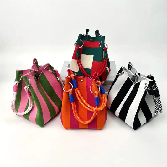 This multi-color knitted retro bucket handbag is simple and color-blocked, versatile and easy to carry with you