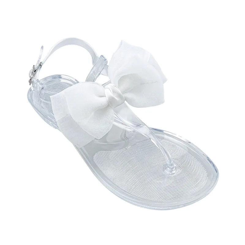 Flat Soled Sandals Women's 2026 Summer New Simple Jelly Outer Wear Casual Versatile Solid Color Transparent Beach Sandals Women